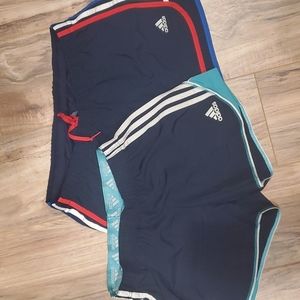 Set of 2 pairs of adidas athletic shorts.